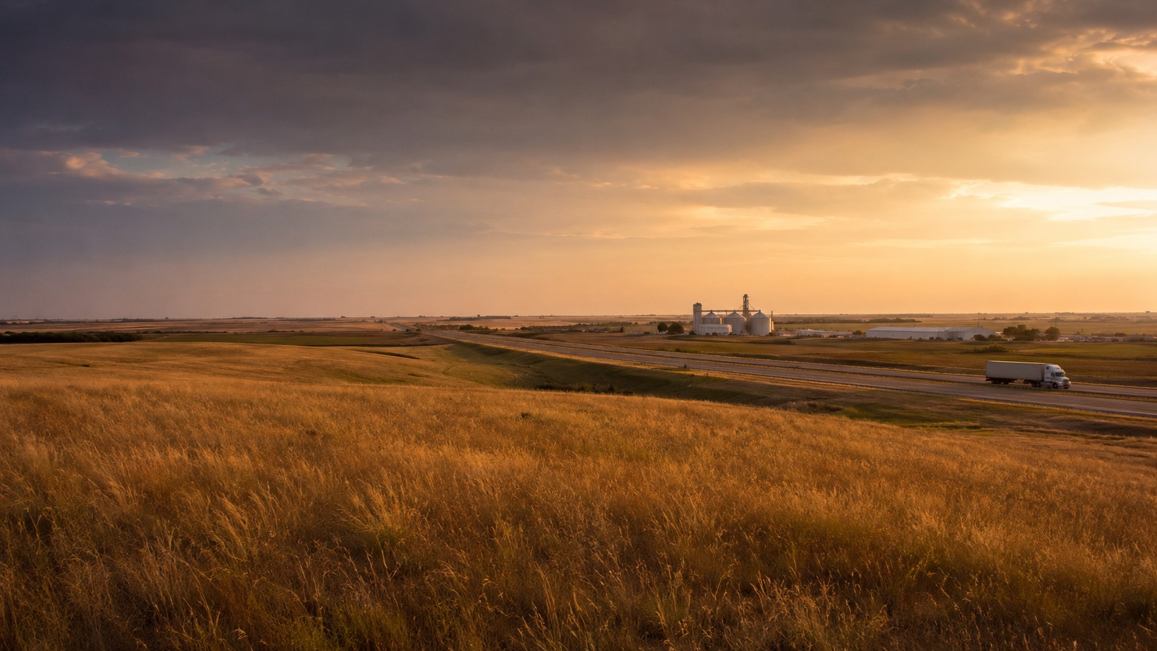 North-central Kansas prairie and highway near Salina at golden hour